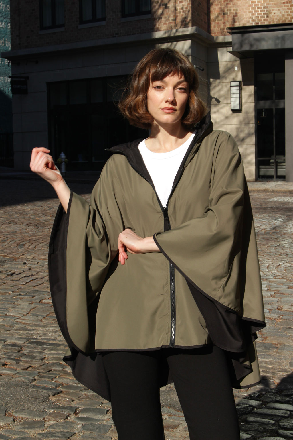 Black & Olive SPORTYRAP | Woman's Rain Jacket - fashionable and practical rain gear by RAINRAPS