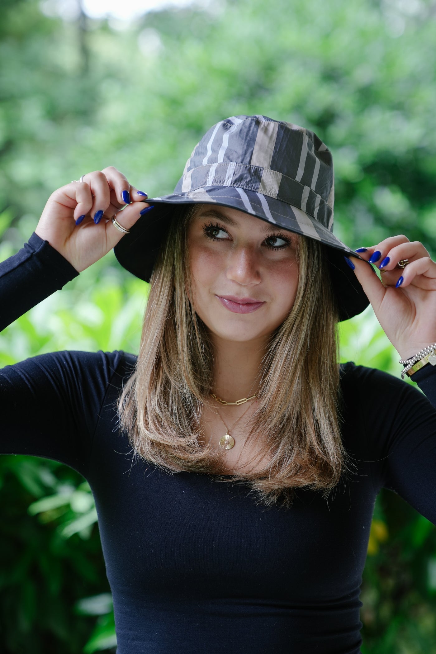 Black & Cabana Stripe RAINCAP | Women's Bucket Hat - fashionable and practical rain gear by RAINRAPS